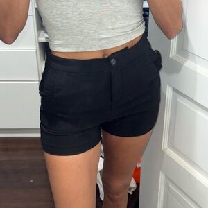 Black Dress shorts with ruffle pockets 
Worn once
size s